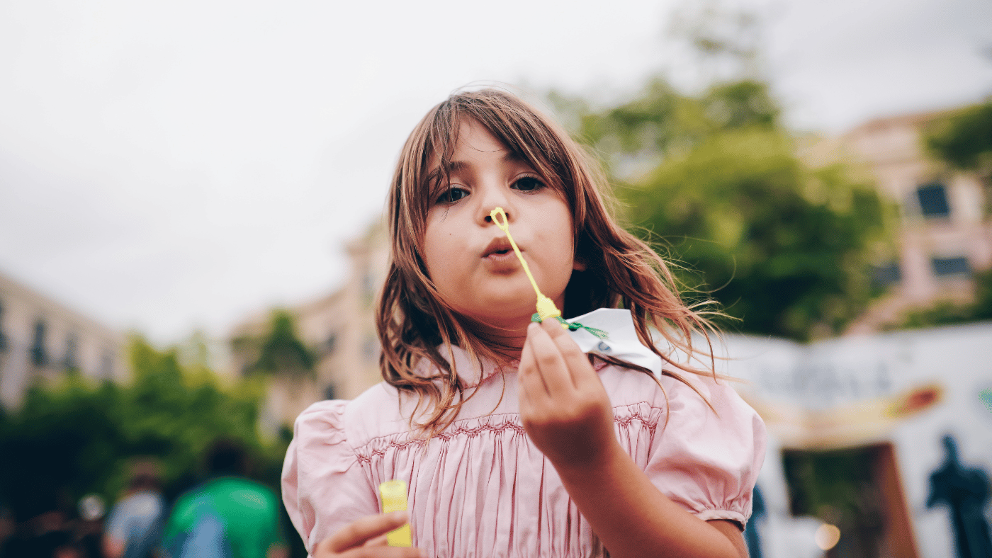 Girl blowing bubbles. Old Memories. Share Words Of Wisdom