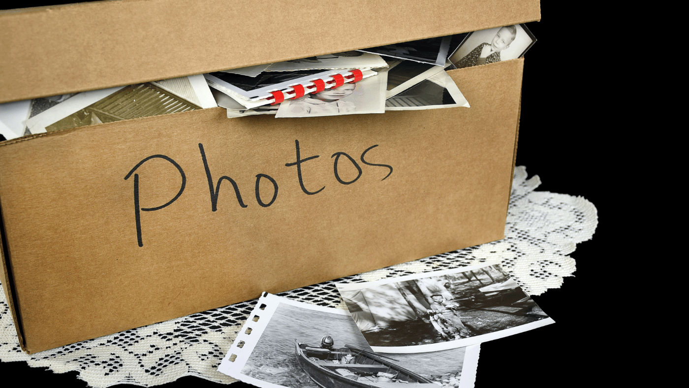box of photos. old photos. old memories. Embracing November: A Month of Remembrance with Klokbox Storyboxes